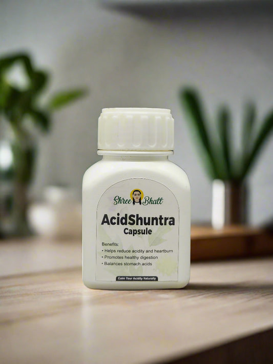 Bottle of AcidShuntra Capsule on a dark gray background